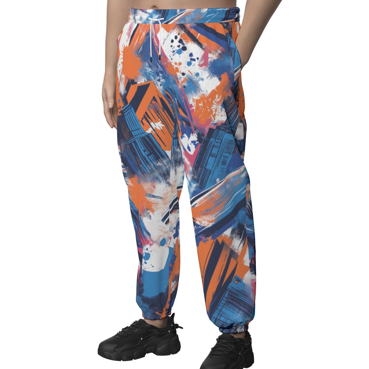 Featherlite textured casual pants angled front view in New York blue/orange/graffiti