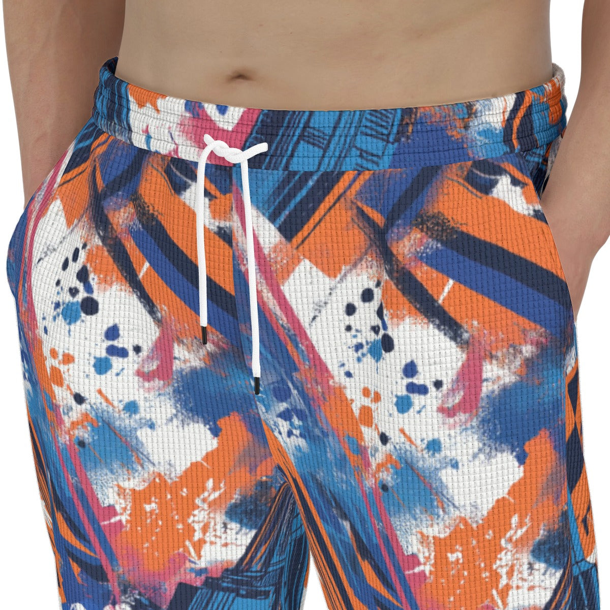 Men's thermal waffle tapered sweatpants back view in New York blue/orange/black