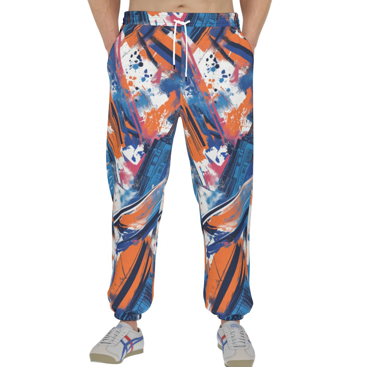 Men's thermal waffle tapered sweatpants flat lay view in New York blue/orange/black