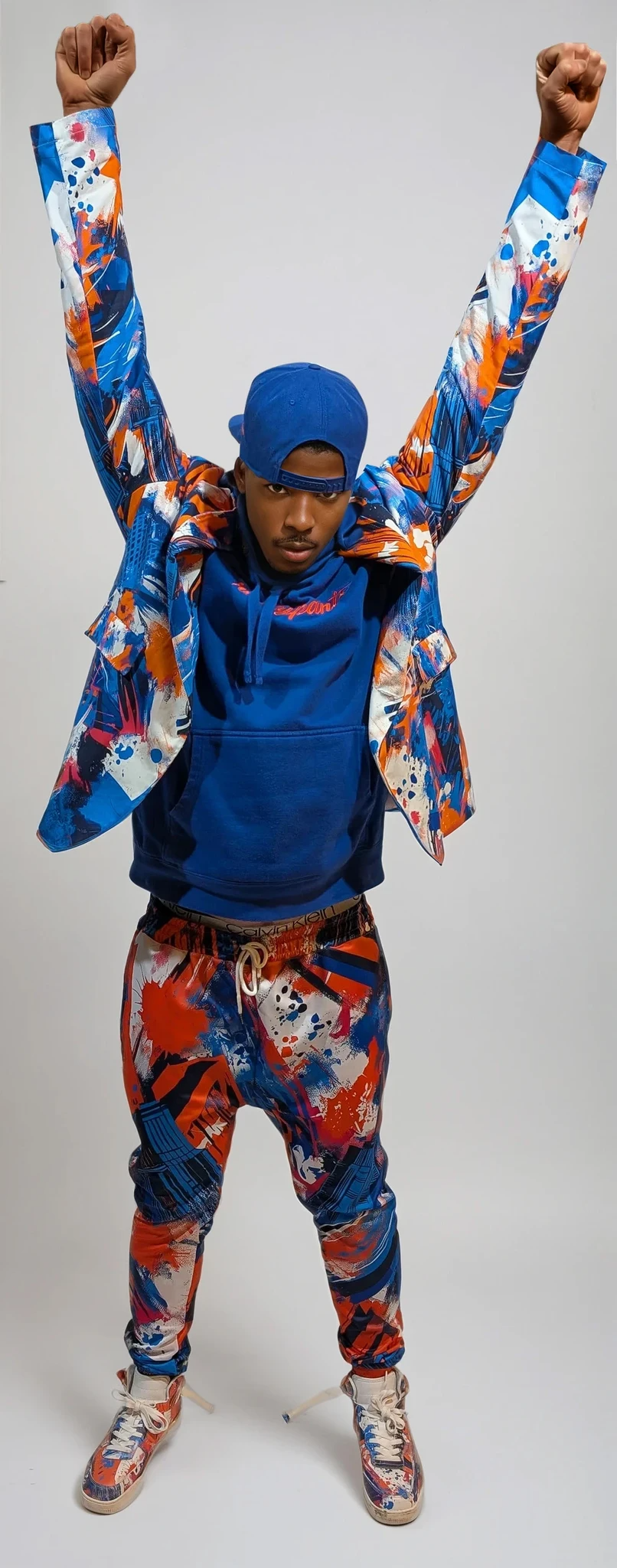 rallypants nyc orange blue graffiti victory graphic for New York basketball fanwear